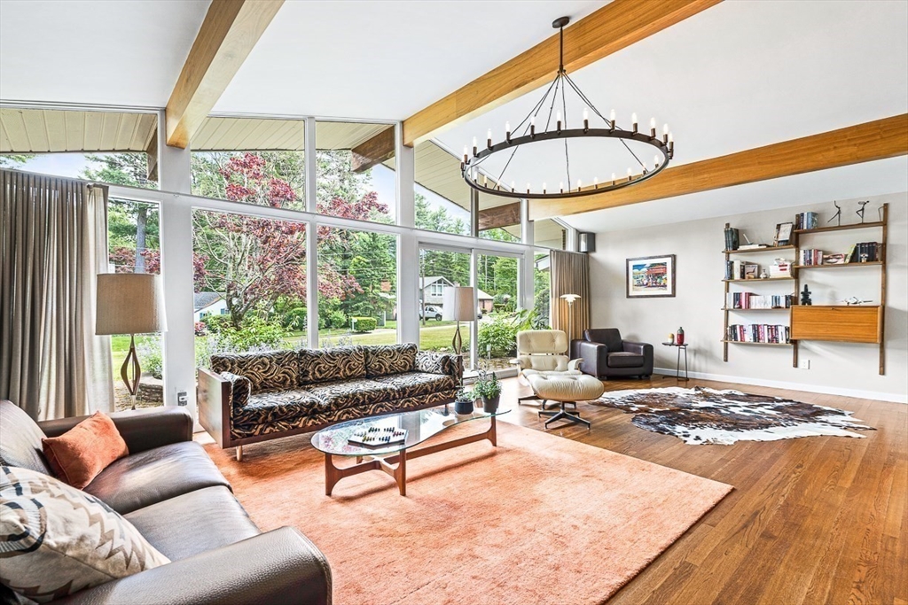 12 Alexandra Road Lynnfield, MA 01940 - Photo 16 of 42 a living room with furniture a lamp and a table