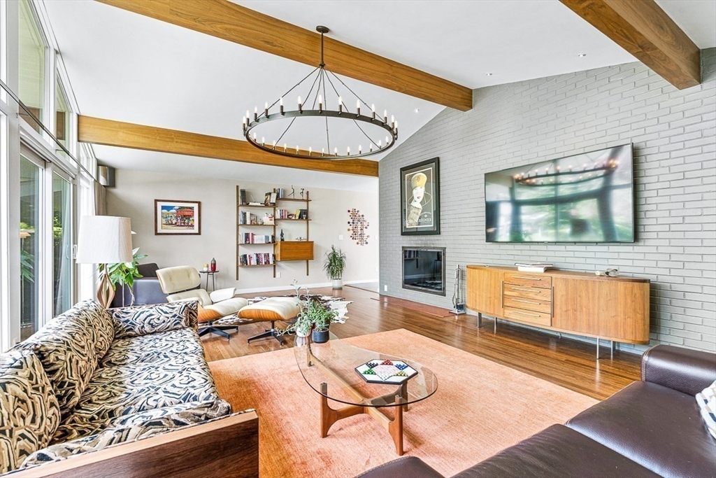 12 Alexandra Road Lynnfield, MA 01940 - Photo 17 of 42 a living room with furniture and a flat screen tv