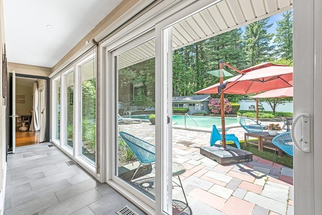 12 Alexandra Road Lynnfield, MA 01940 - Photo 20 of 42 a very nice looking room with a large window and a fountain