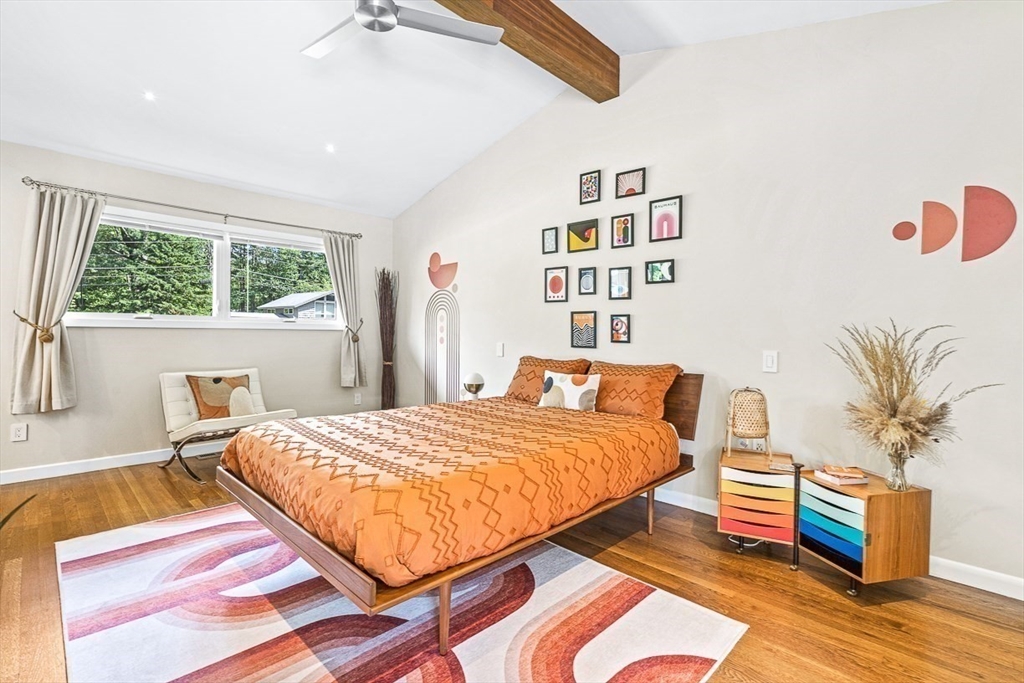 12 Alexandra Road Lynnfield, MA 01940 - Photo 26 of 42 a bedroom with a bed and a painting on the wall