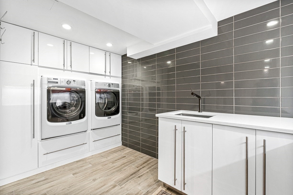 12 Alexandra Road Lynnfield, MA 01940 - Photo 31 of 42 a utility room with dryer and washer