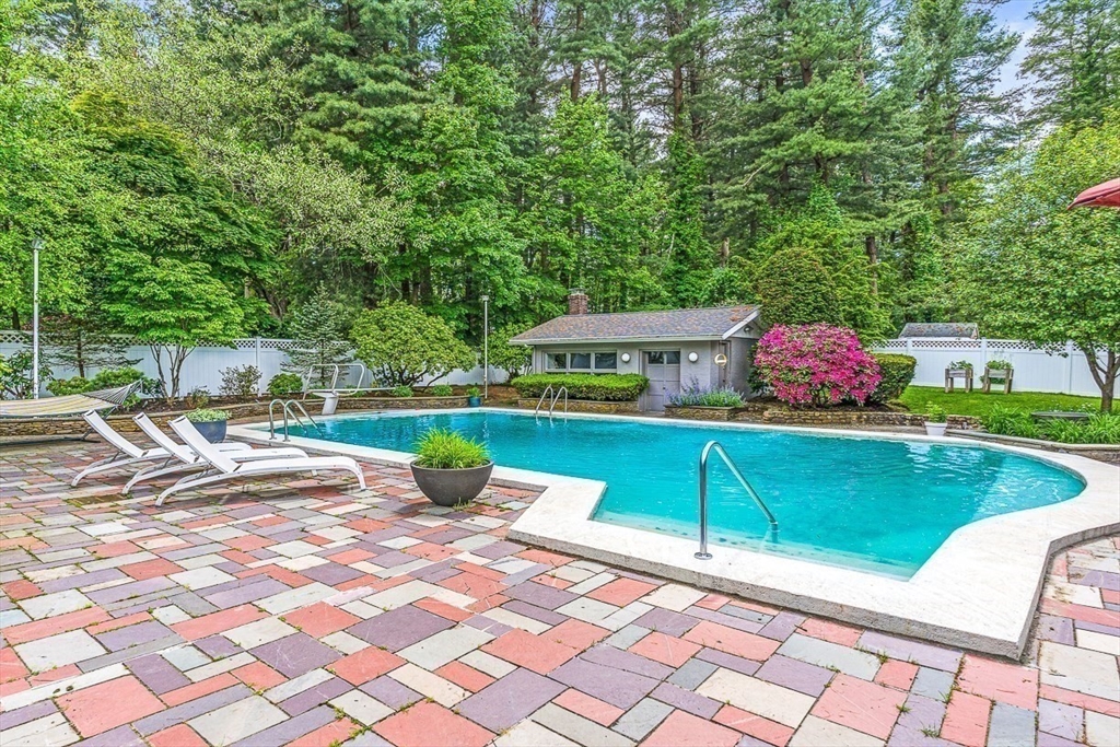 12 Alexandra Road Lynnfield, MA 01940 - Photo 36 of 42 a view of a swimming pool with a patio