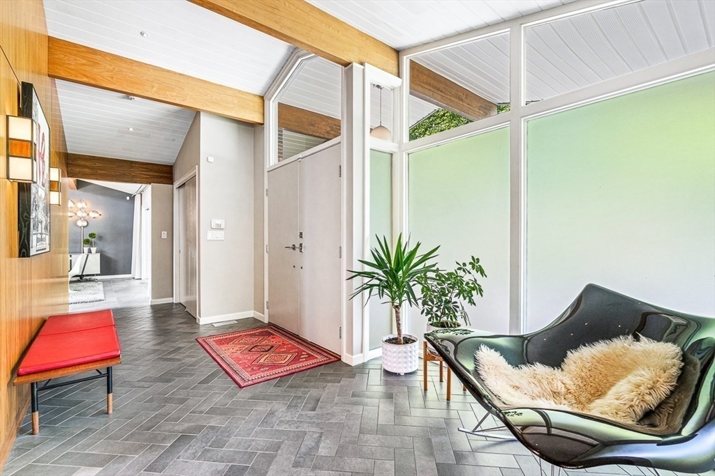 12 Alexandra Road Lynnfield, MA 01940 - Photo 5 of 42 a living room with furniture and a table