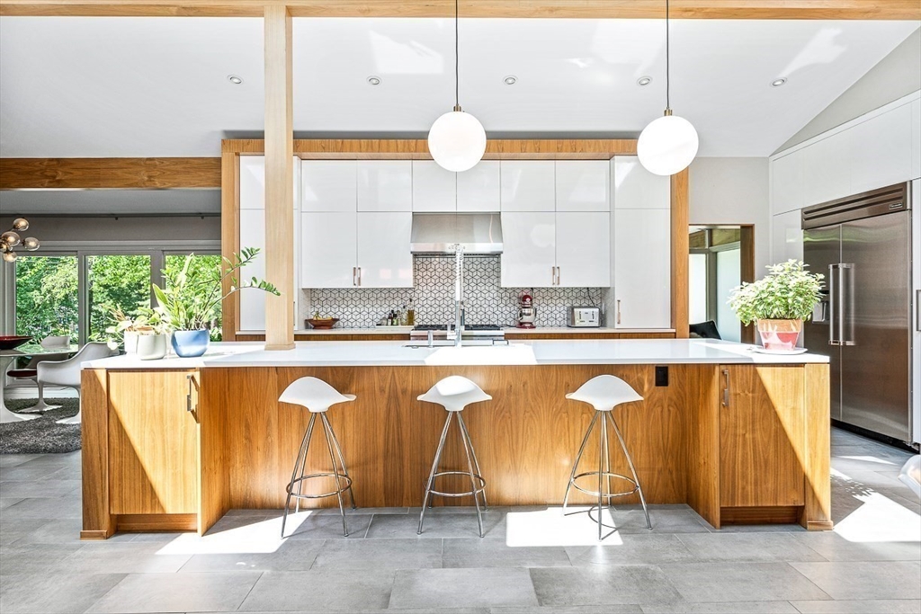 12 Alexandra Road Lynnfield, MA 01940 - Photo 10 of 42 a large white kitchen with a large window