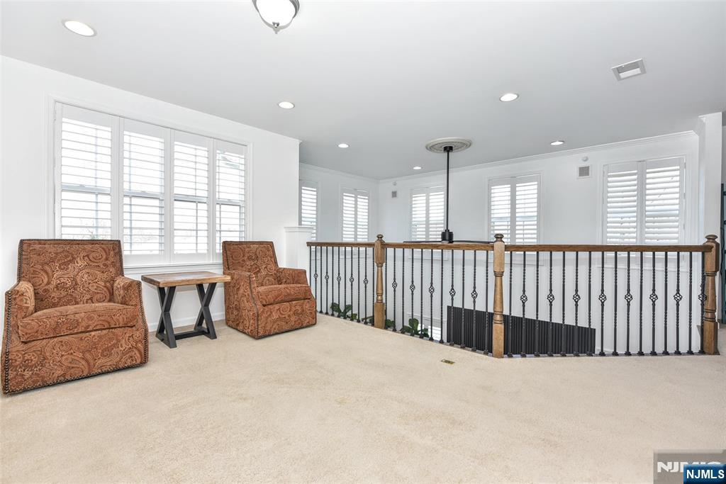 28 Autumn Way, Unit 72 Montvale, NJ 07645 - Photo 22 of 34 a living room with furniture and windows