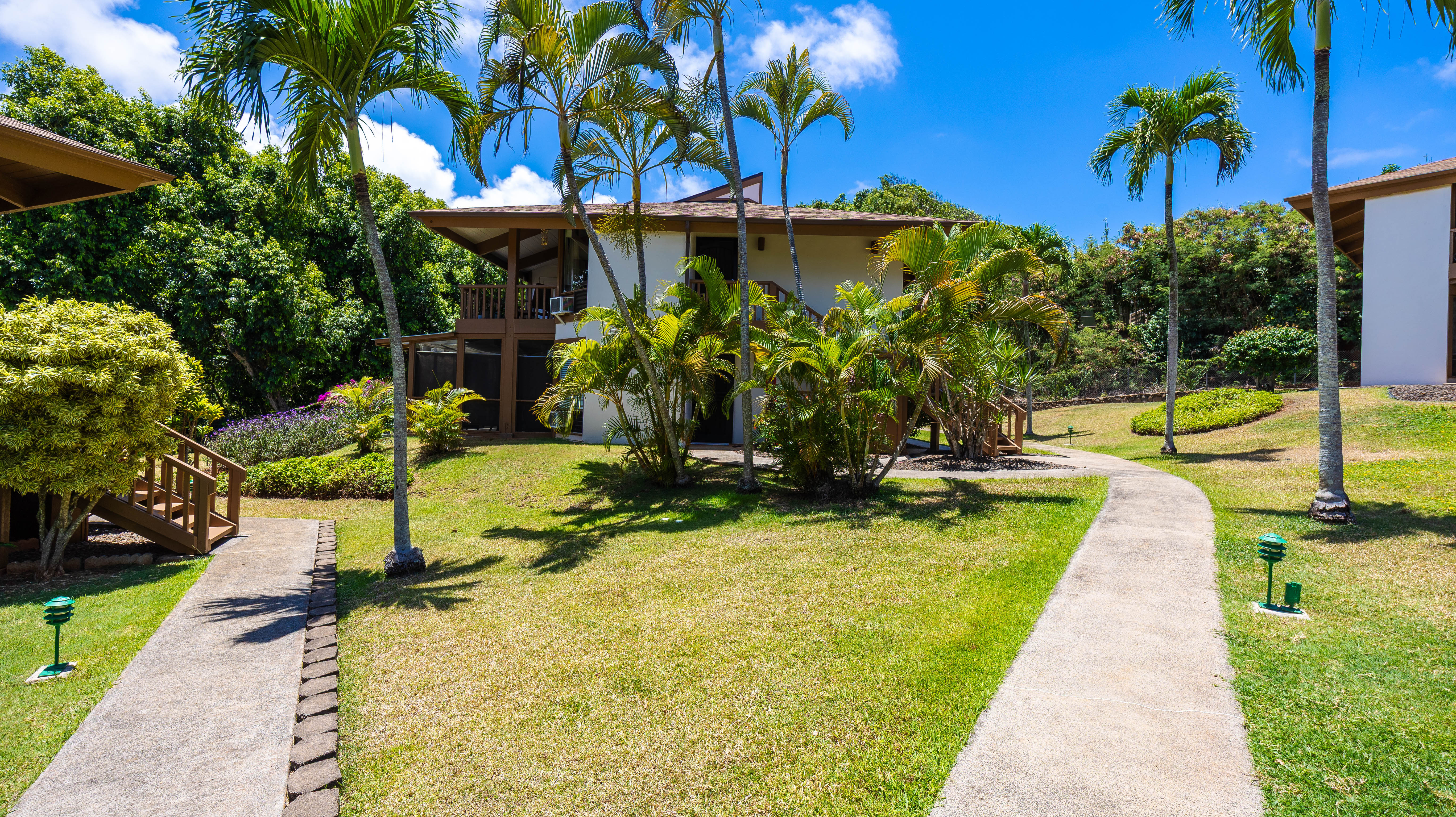 4701 Kawaihau Road, Unit L201 Kapaa, HI 96746 - Photo 23 of 29 a view of a swimming pool with a patio