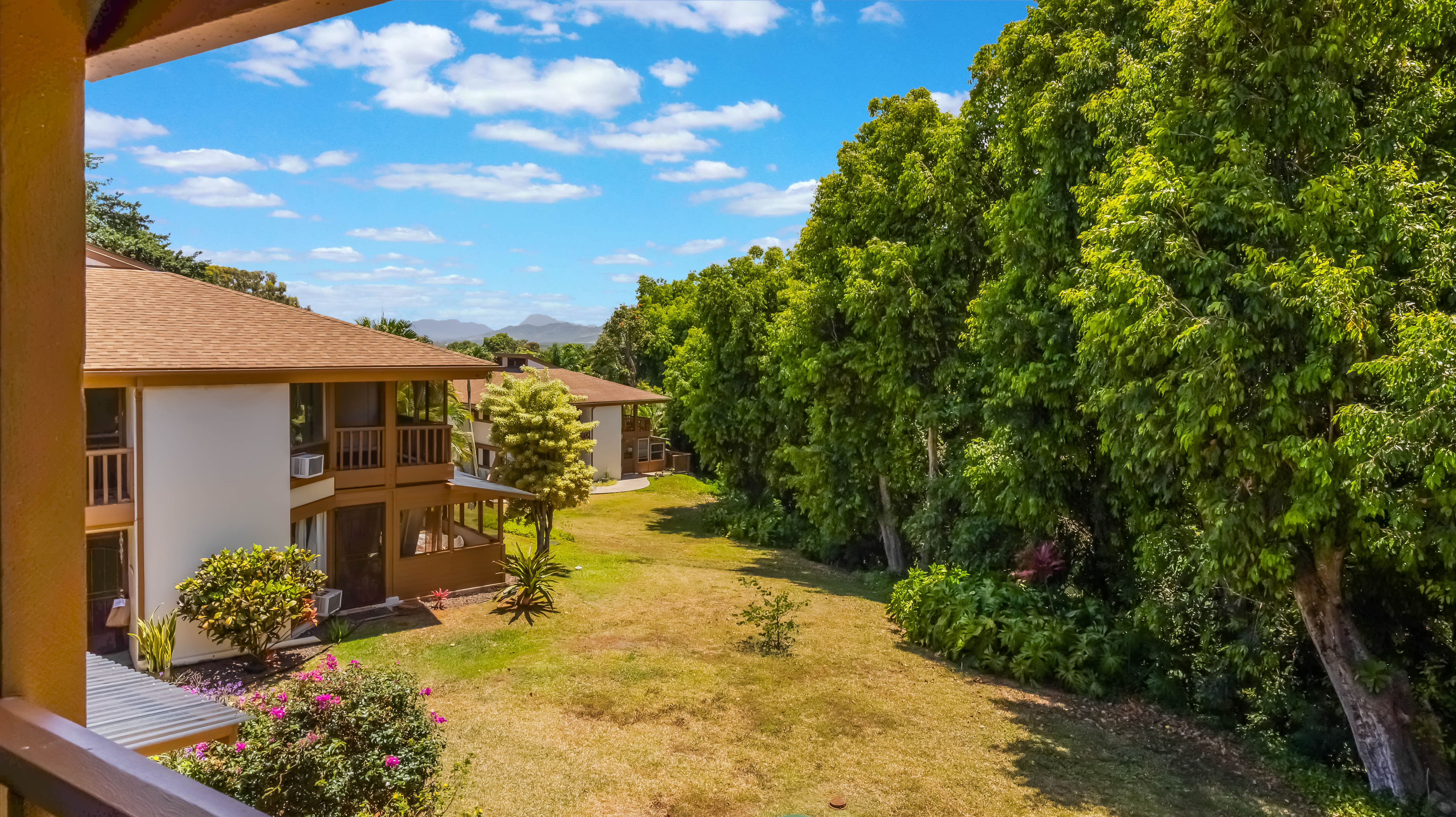 4701 Kawaihau Road, Unit L201 Kapaa, HI 96746 - Photo 25 of 29 a view of a backyard with sitting area