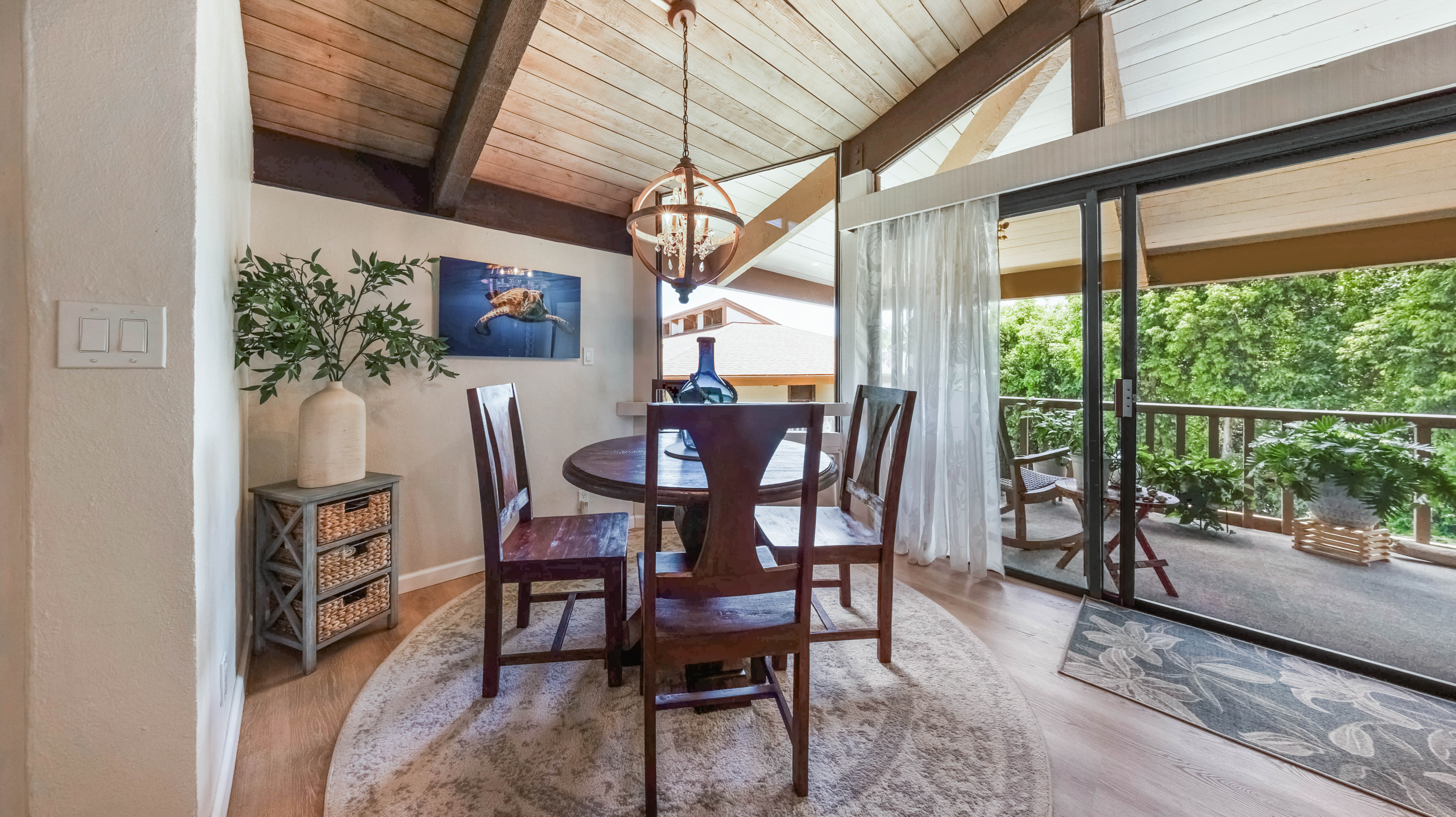4701 Kawaihau Road, Unit L201 Kapaa, HI 96746 - Photo 7 of 29 a view of a dining room with furniture window and outside view