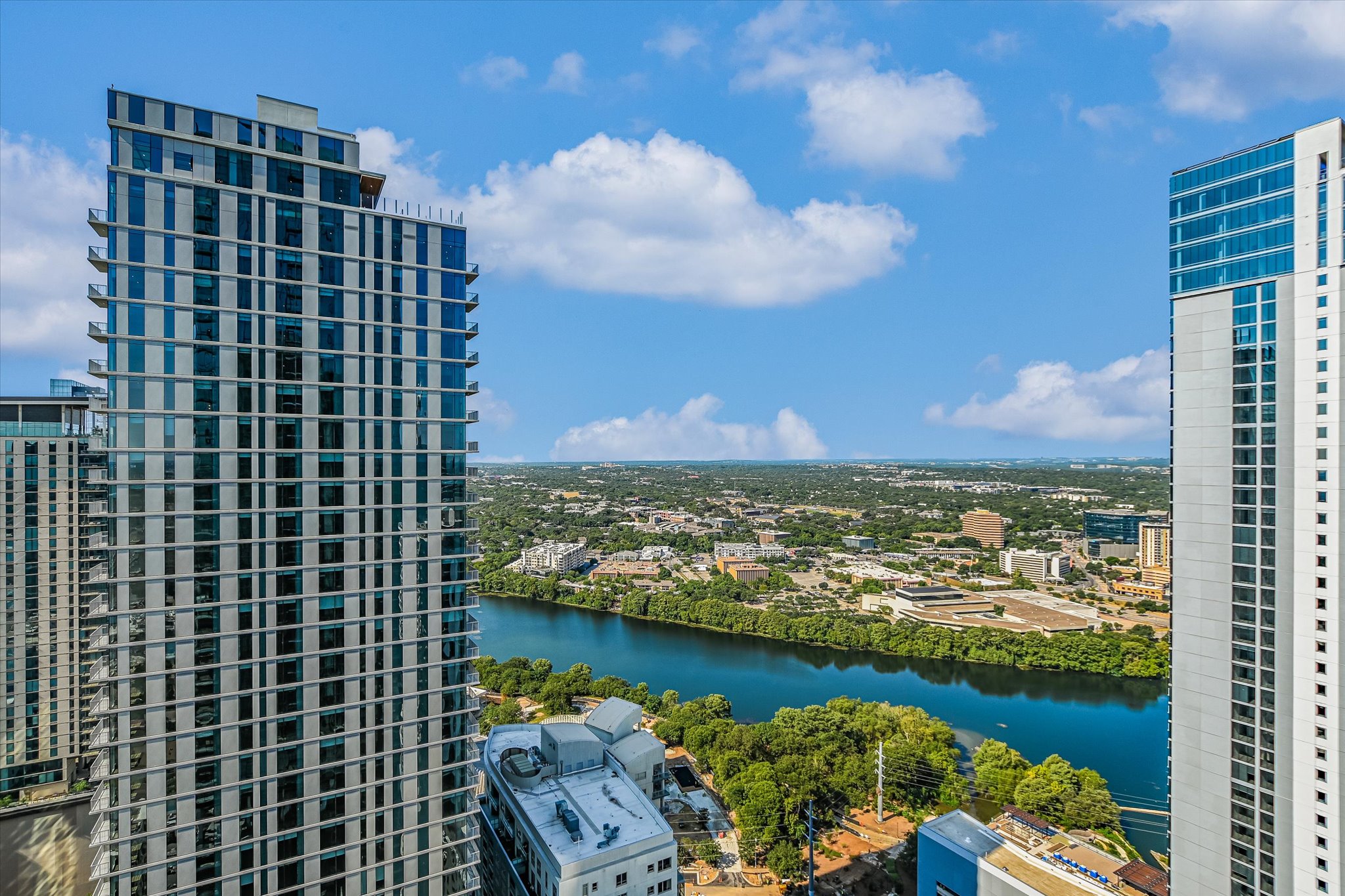 610 Davis Street, Unit 3801 Austin, TX 78701 - Photo 2 of 40 a view of a city with tall buildings