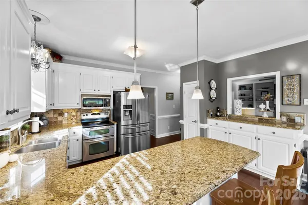 a large kitchen with cabinets