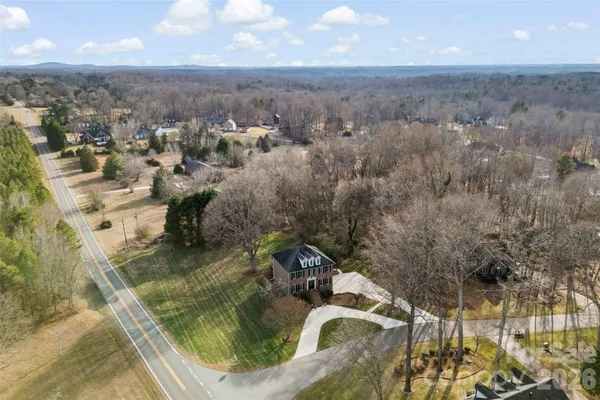 an aerial view of residential house with outdoor space
