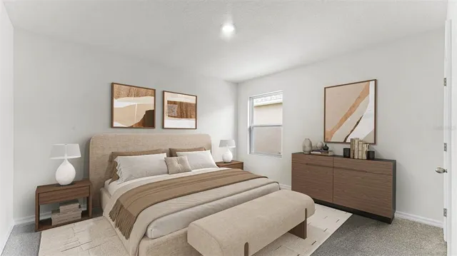 a bedroom with a bed and a dresser