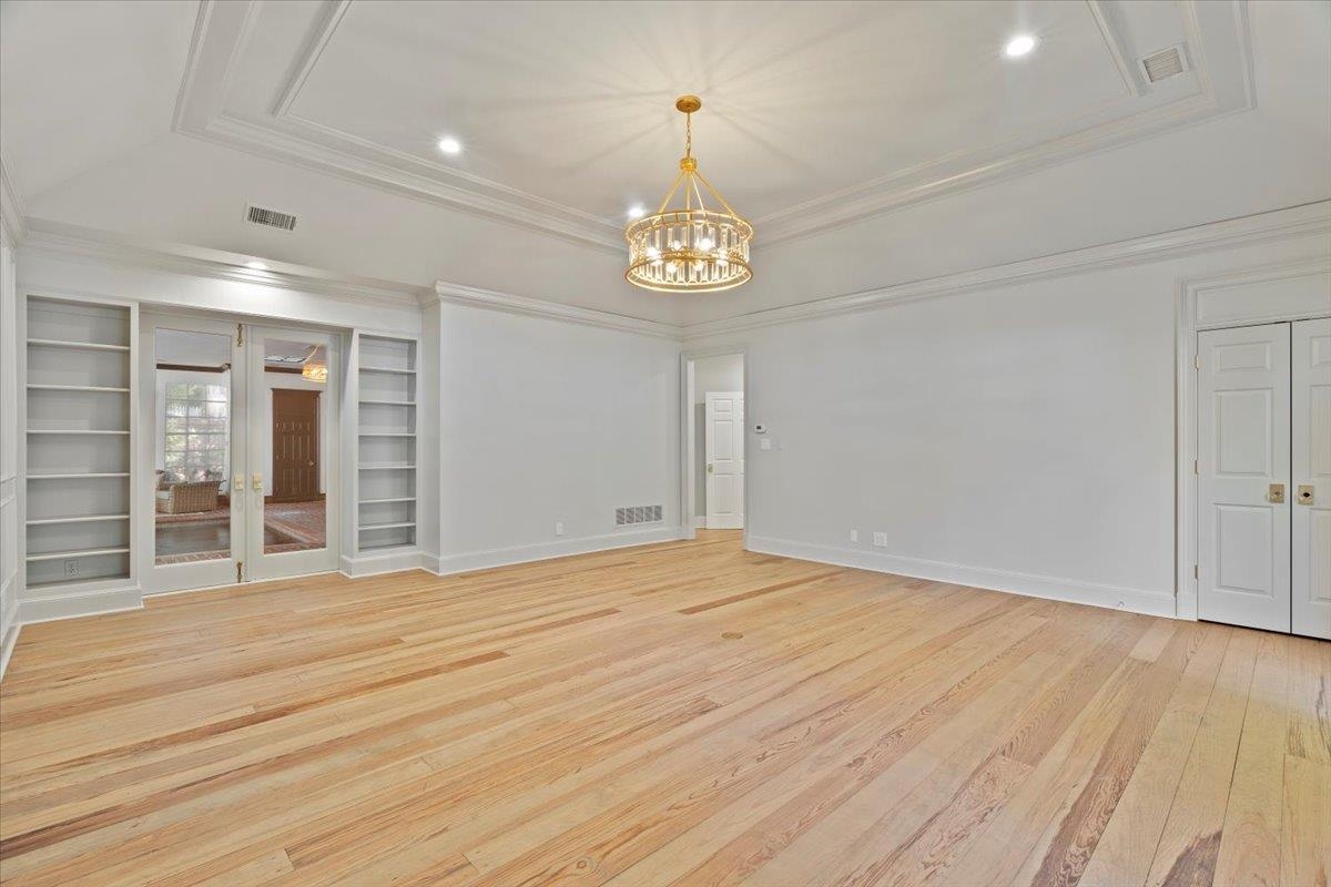 425 River Oaks Road Memphis, TN 38120 - Photo 18 of 39 a view of empty room with wooden floor