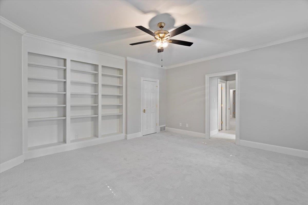 425 River Oaks Road Memphis, TN 38120 - Photo 29 of 39 a view of an empty room with a ceiling fan