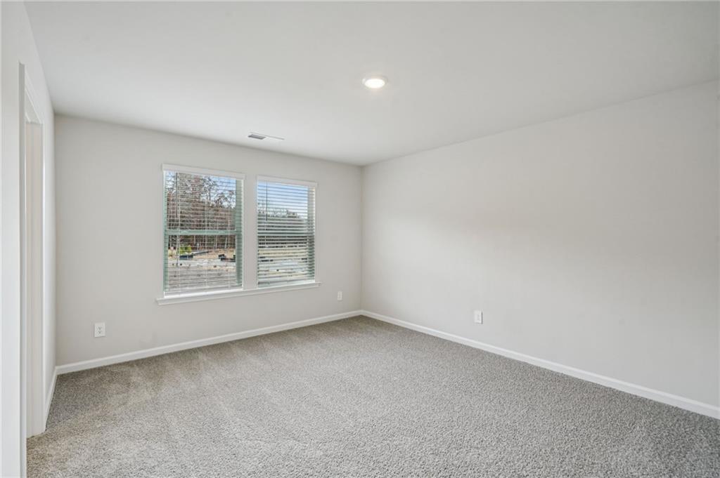 2004 Nolan Way Conyers, GA 30013 - Photo 15 of 23 an empty room with a window