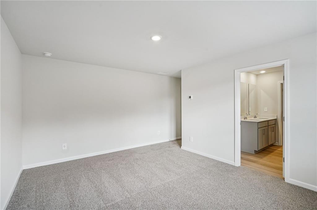 2004 Nolan Way Conyers, GA 30013 - Photo 17 of 23 a view of an empty room and kitchen