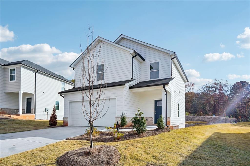 2004 Nolan Way Conyers, GA 30013 - Photo 2 of 23 a house view with a outdoor space