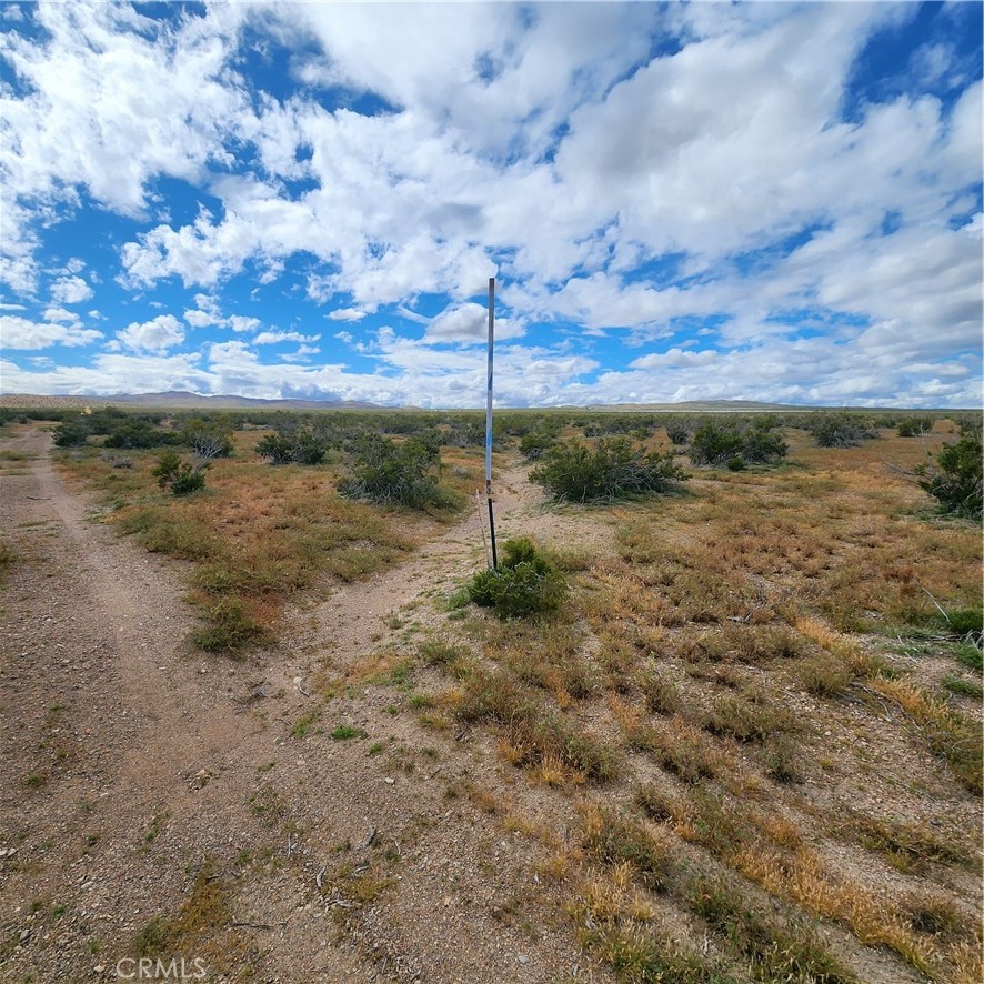 8191 Colusa Road Adelanto, CA 92301 - Photo 1 of 1 a view of a lake with a big yard