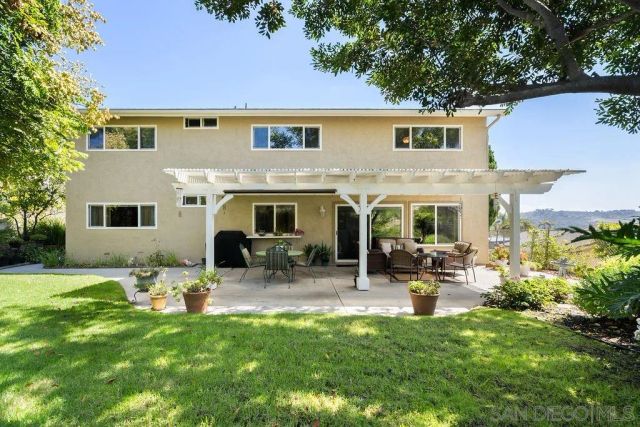 a bedroom with a bed and dresser