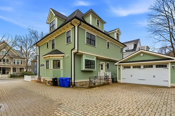 a view of a house with a street