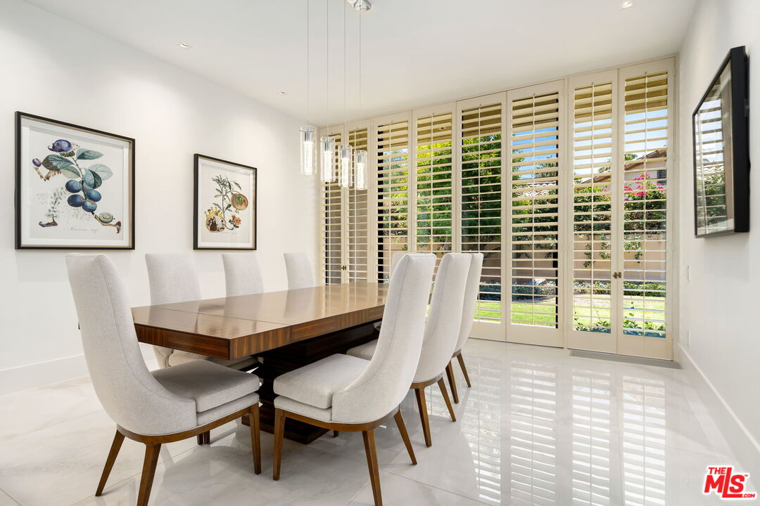 40590 Morningstar Road Rancho Mirage, CA 92270 - Photo 16 of 39 a view of a dining room with furniture and a window