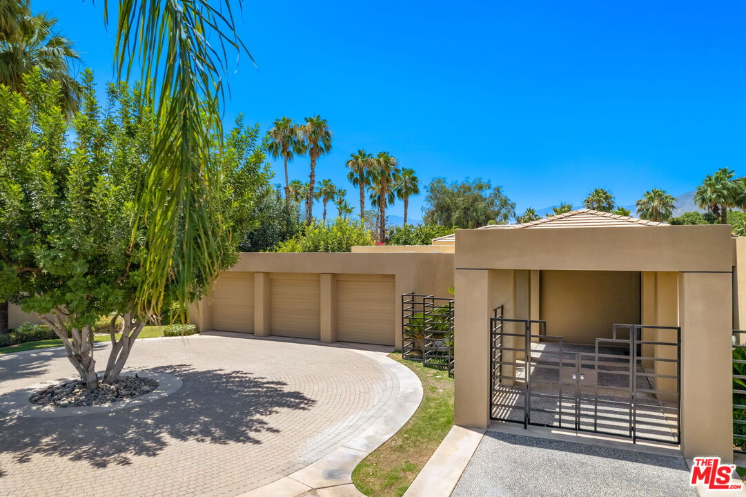 40590 Morningstar Road Rancho Mirage, CA 92270 - Photo 36 of 39 a view of a house with a backyard