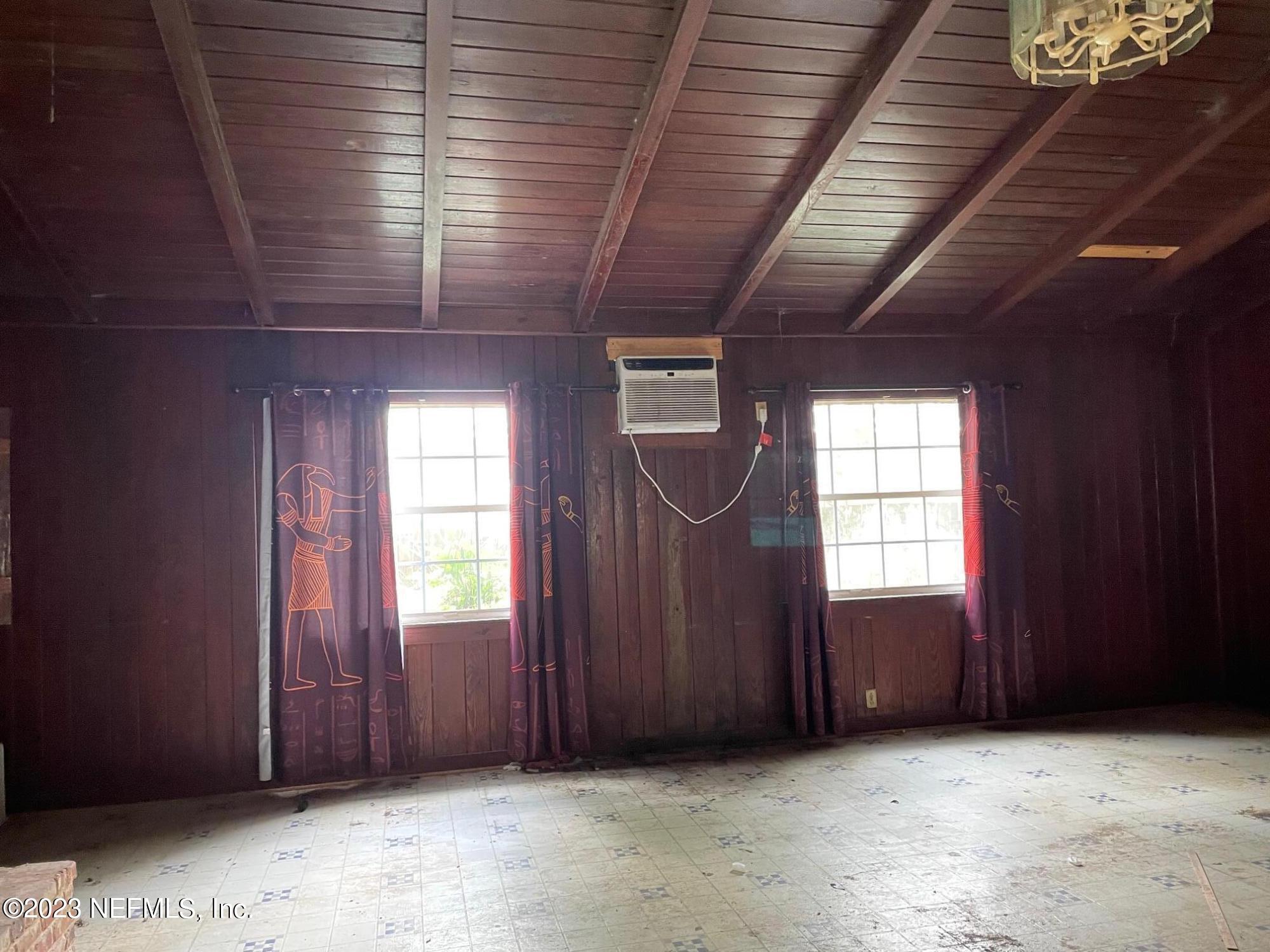 2614 Red Fox Road Orange Park, FL 32073 - Photo 5 of 7 an empty room with windows