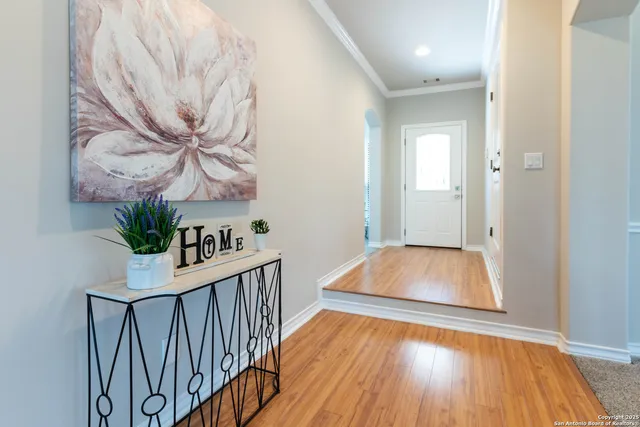 a view of livingroom with furniture and wooden floor