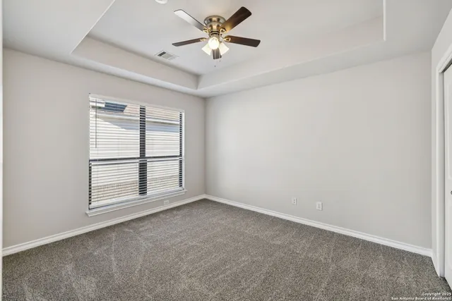 a view of a balcony with wooden floor