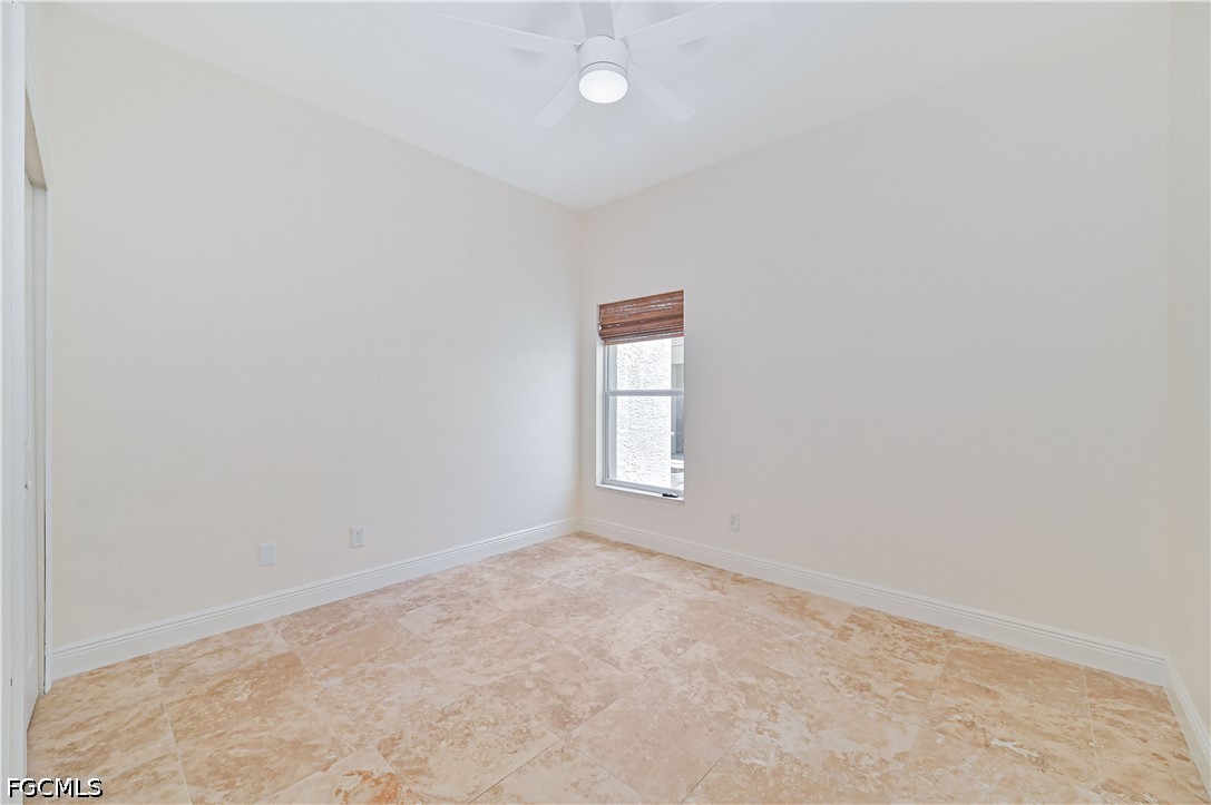14967 Rivers Edge Court, Unit B1 Fort Myers, FL 33908 - Photo 17 of 36 an empty room with windows