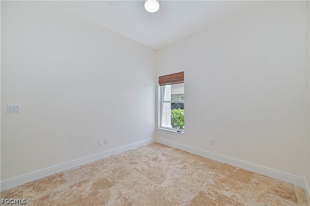 14967 Rivers Edge Court, Unit B1 Fort Myers, FL 33908 - Photo 20 of 36 a view of an empty room with a window