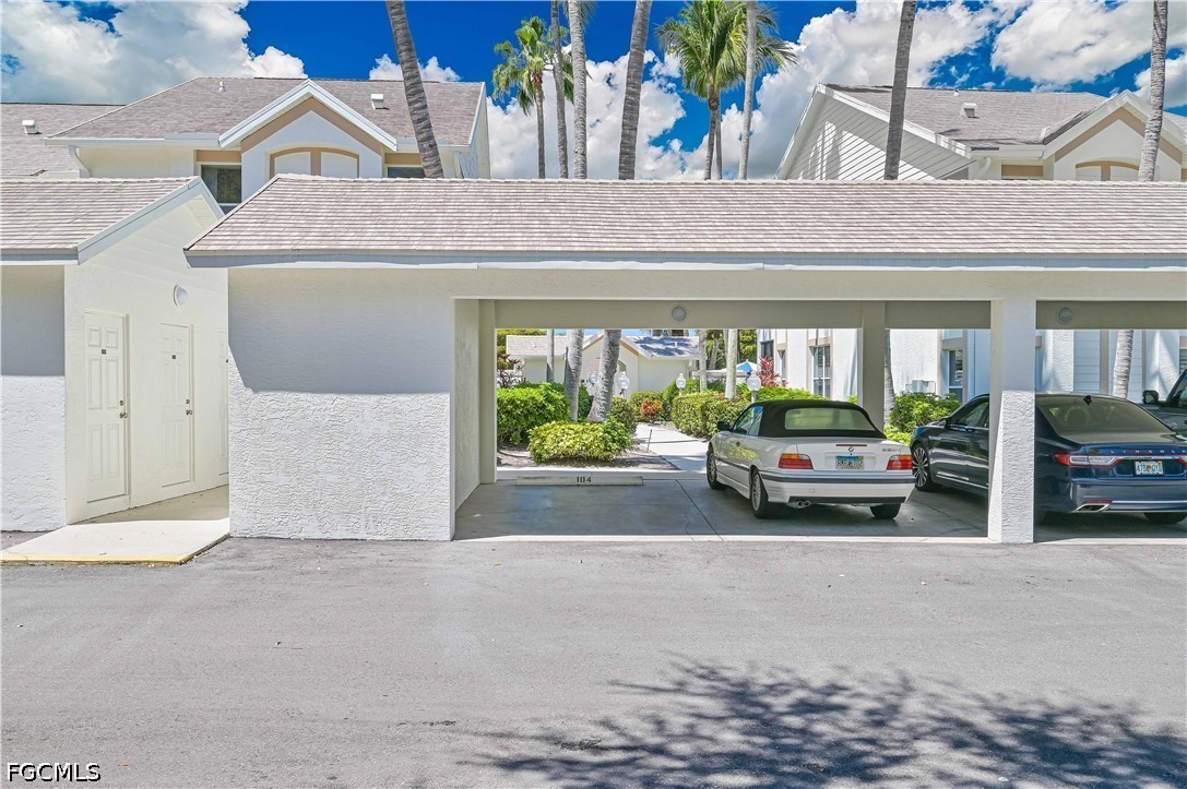 14967 Rivers Edge Court, Unit B1 Fort Myers, FL 33908 - Photo 32 of 36 a view of garage with furniture