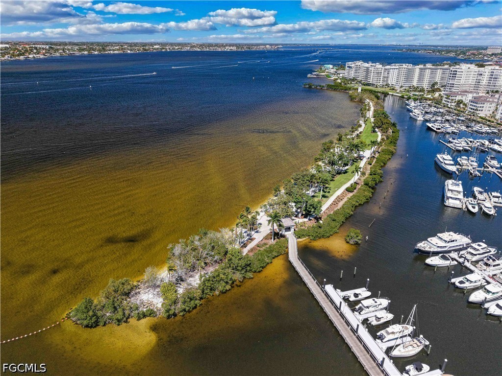 14967 Rivers Edge Court, Unit B1 Fort Myers, FL 33908 - Photo 35 of 36 a view of an ocean from a balcony