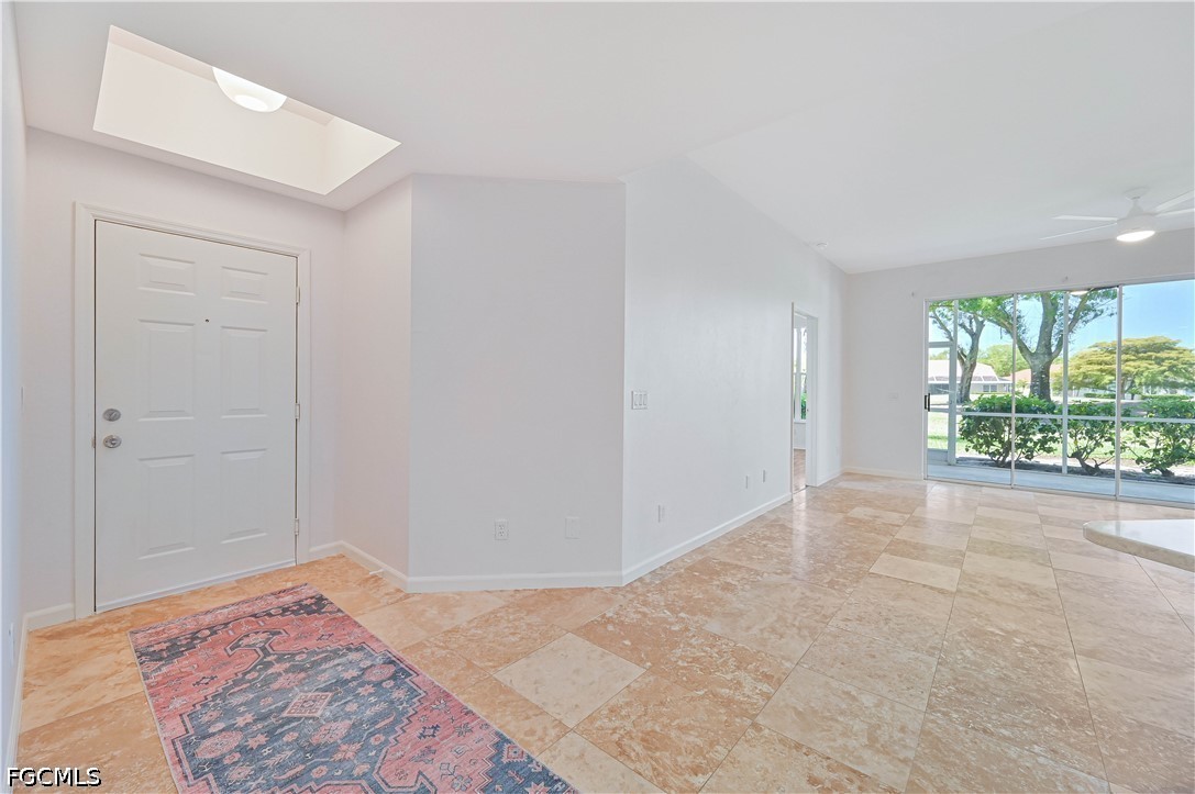 14967 Rivers Edge Court, Unit B1 Fort Myers, FL 33908 - Photo 10 of 36 an empty room with a window