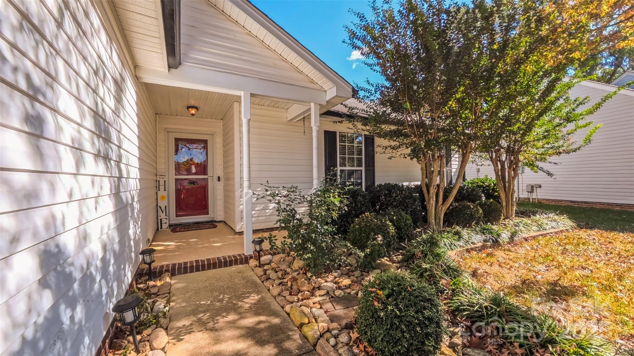 3693 Stonefield Street Southwest Concord, NC 28027 - Photo 2 of 27 a view of backyard of the house