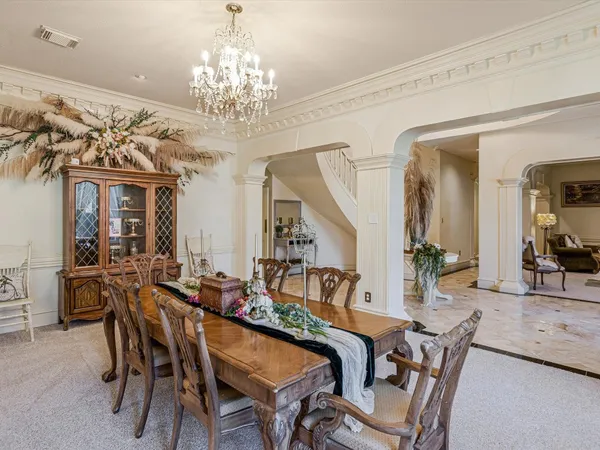 a view of a livingroom with furniture and front door