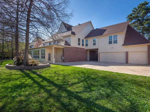 a view of a dining room and hall with furniture