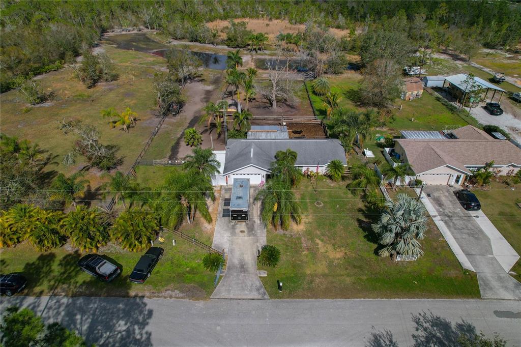 208 Limpkin Lane Frostproof, FL 33843 - Photo 43 of 60 an aerial view of residential houses with outdoor space