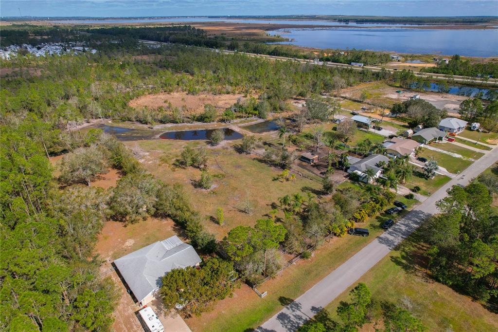 208 Limpkin Lane Frostproof, FL 33843 - Photo 46 of 60 a view of a lake with outdoor space