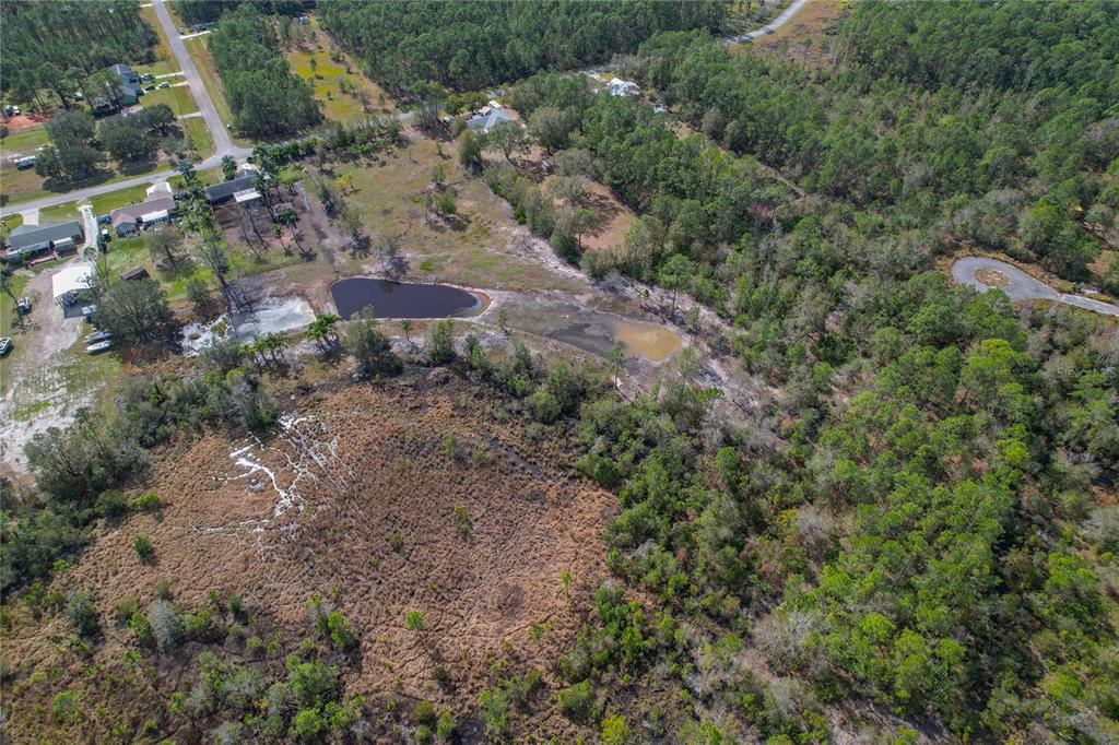 208 Limpkin Lane Frostproof, FL 33843 - Photo 56 of 60 an aerial view of house with outdoor space