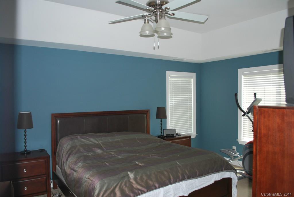 8612 Ridgeline Lane Charlotte, NC 28269 - Photo 11 of 20 a bedroom with a bed and window