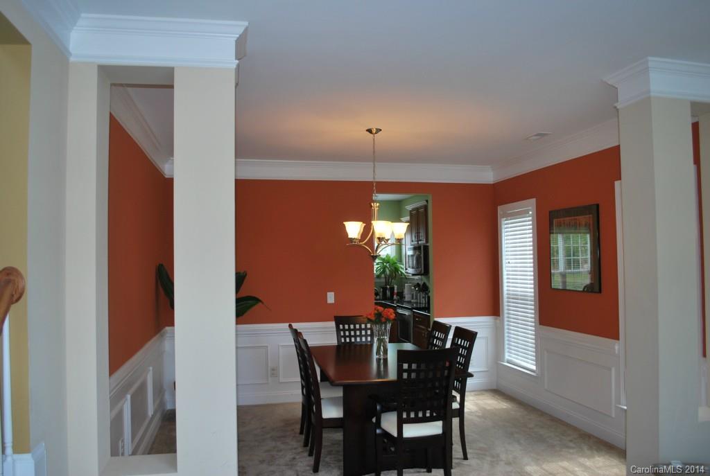 8612 Ridgeline Lane Charlotte, NC 28269 - Photo 4 of 20 a view of a dining room with furniture and window