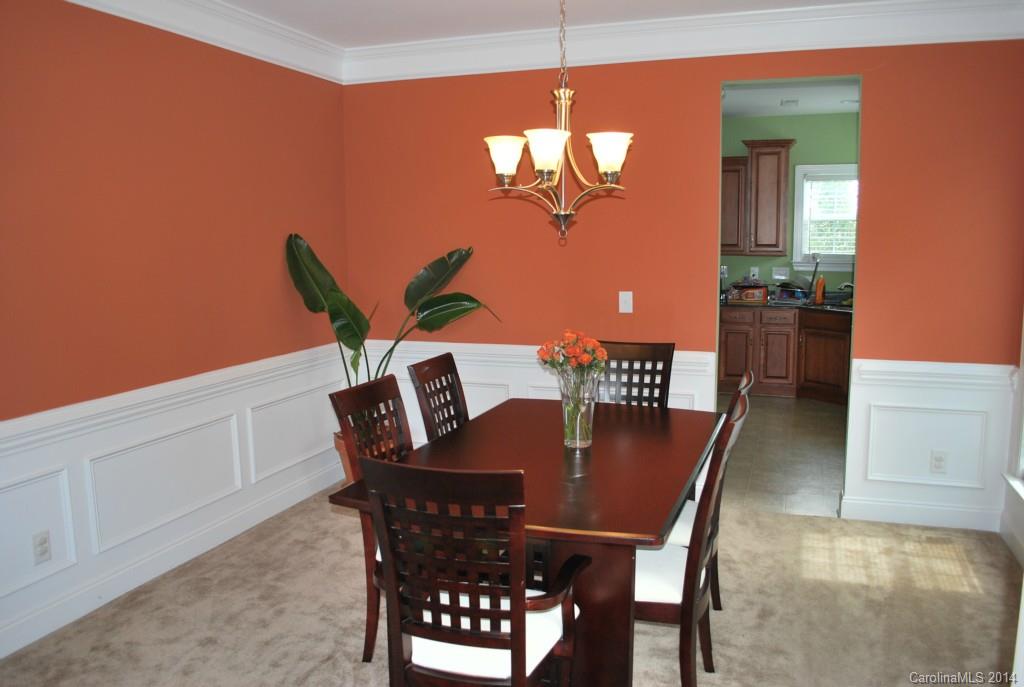 8612 Ridgeline Lane Charlotte, NC 28269 - Photo 5 of 20 a view of a dining room with furniture and wooden floor