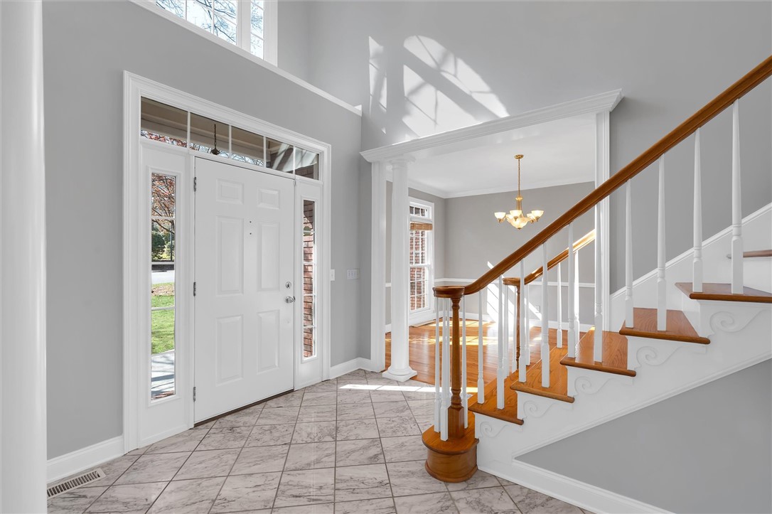 204 Red Maple Way Clemson, SC 29631 - Photo 4 of 48 This grand foyer welcomes you with soaring ceilings and an elegant staircase.
