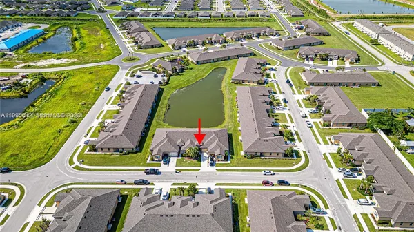 a view of a swimming pool with a garden