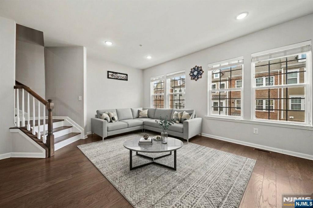 129 Truman Drive Wood-Ridge, NJ 07075 - Photo 11 of 47 a living room with furniture and a table
