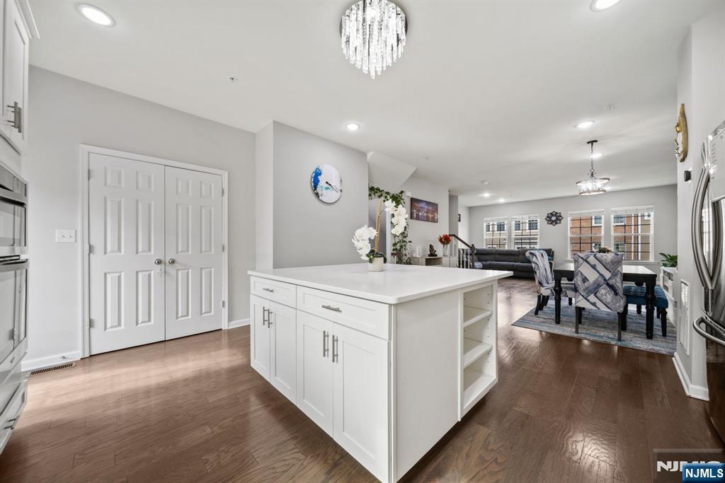 129 Truman Drive Wood-Ridge, NJ 07075 - Photo 21 of 47 a large white kitchen with lots of counter top space