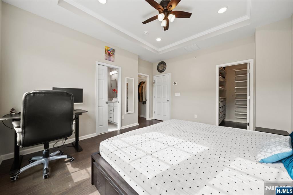 129 Truman Drive Wood-Ridge, NJ 07075 - Photo 25 of 47 a bedroom with a bed and a chair