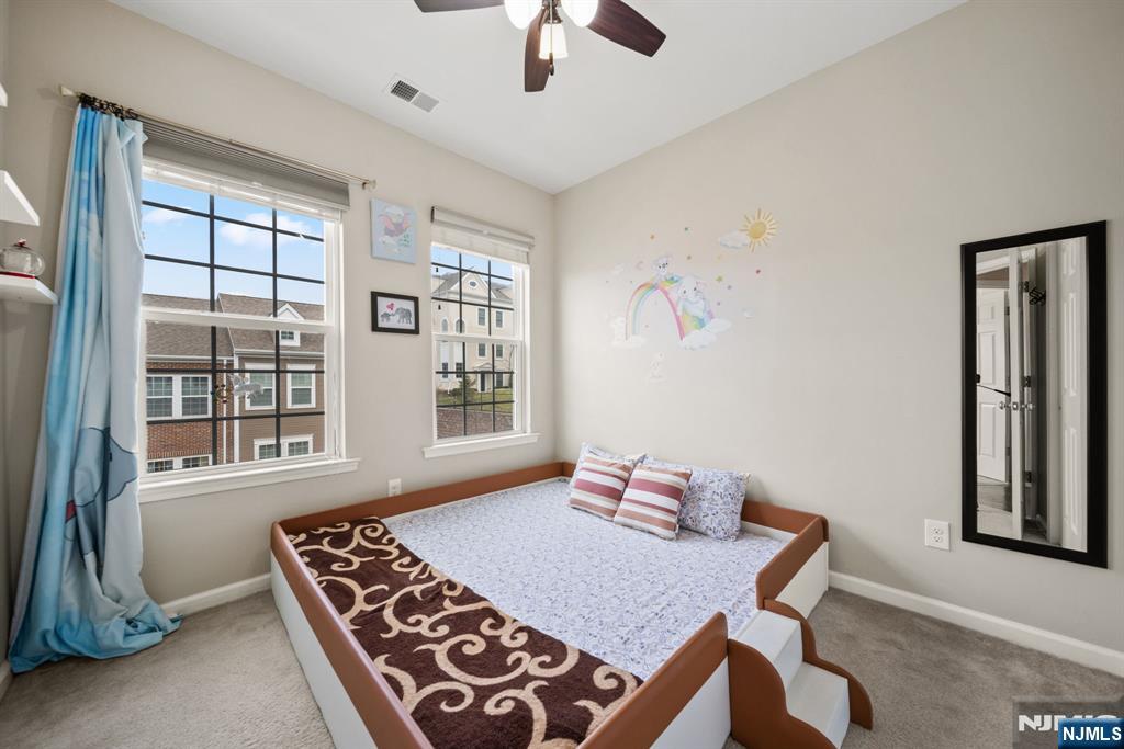 129 Truman Drive Wood-Ridge, NJ 07075 - Photo 30 of 47 a view of a dining room with furniture window and outside view