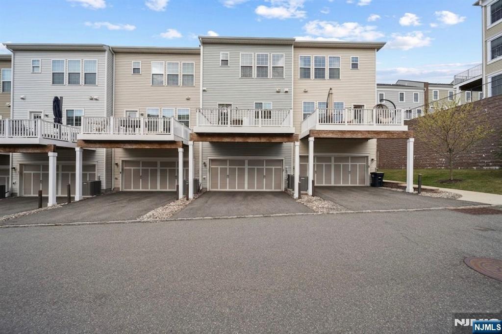 129 Truman Drive Wood-Ridge, NJ 07075 - Photo 34 of 47 a view of a room with kitchen and utility room